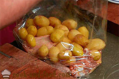 Gebakken kip benen met aardappelen in het gat